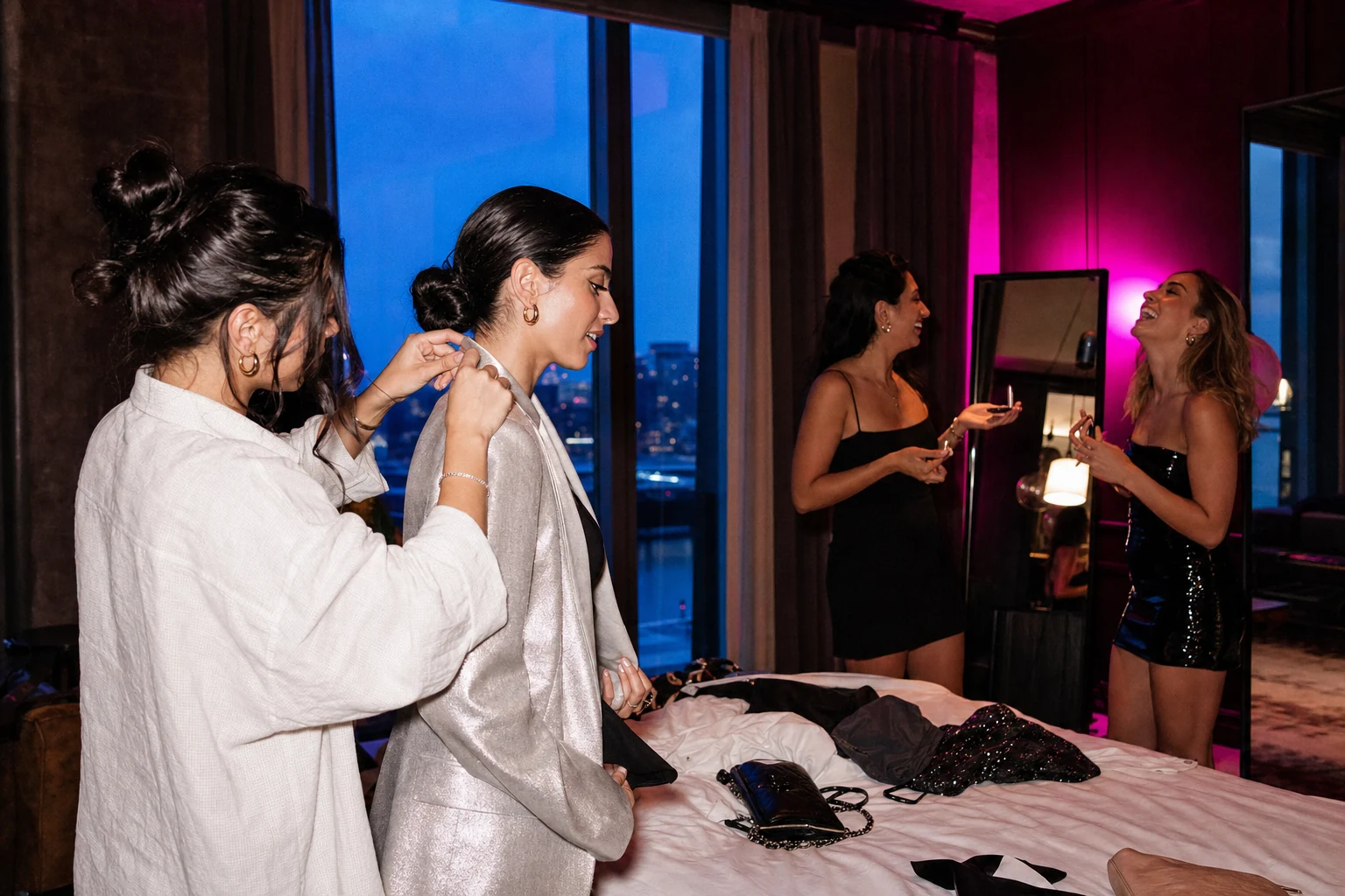 Fashion direct-flash suite party with friends in magenta, cobalt, and silver-white light